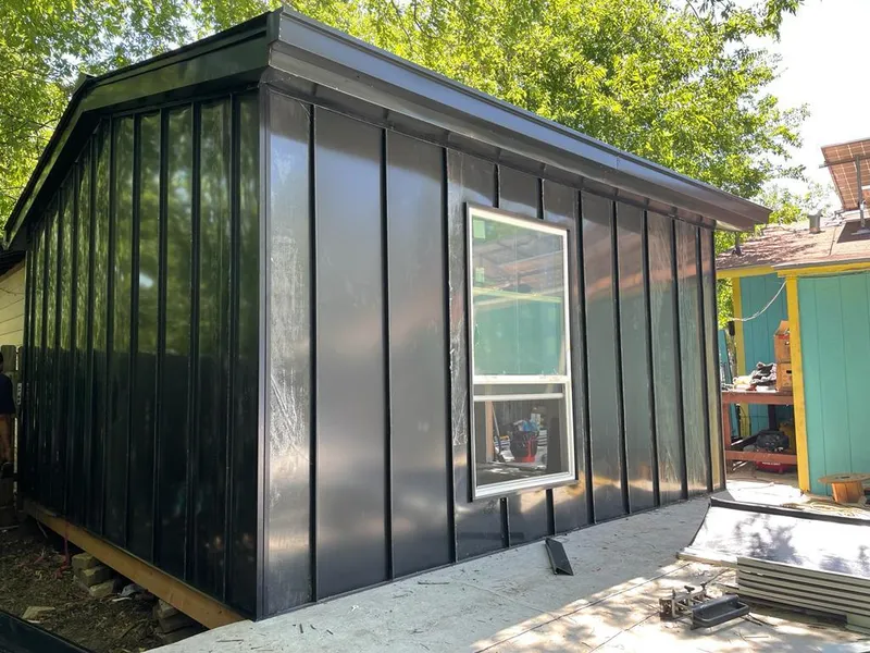 Black standing seam metal wall panels for Metal Roof Installation in Westford