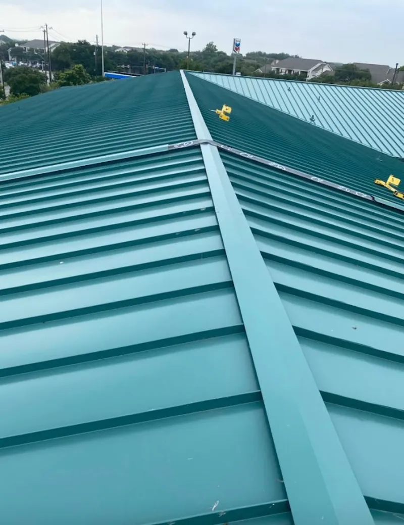 Green commercial metal roof ridge and valley for Metal Roof Repair in Westford