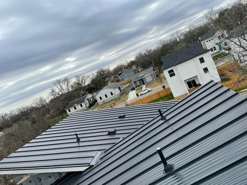 Standing seam metal roof panels with vents for Skylight Repair in Westford